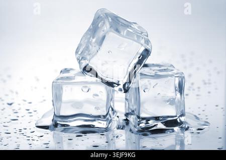 Three melting ice cubes Stock Photo