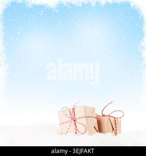Christmas gift boxes in snow Stock Photo