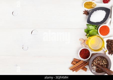 Various spices on white wooden background Stock Photo