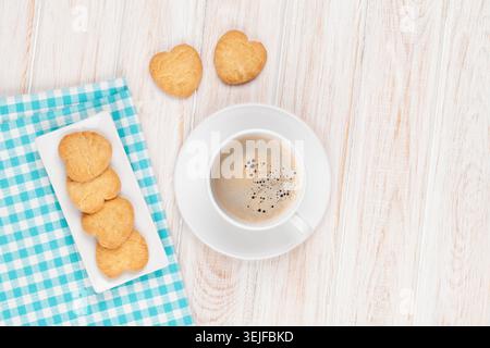 Coffee and heart shaped cookies Stock Photo