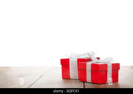 Two gift boxes on wooden table Stock Photo