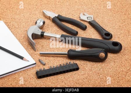 Set of tools on cork background Stock Photo