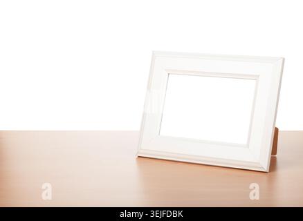 Photo frame on wood table Stock Photo