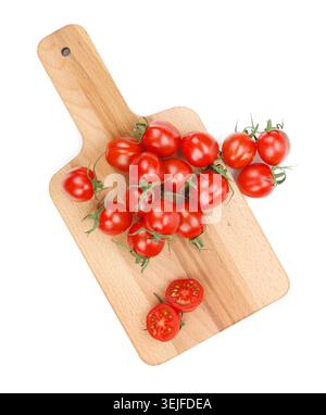 Cherry tomatoes on cutting board Stock Photo