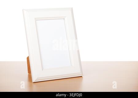 Photo frame on wood table Stock Photo