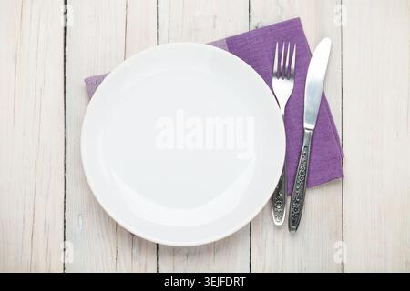 Empty plate and silverware Stock Photo