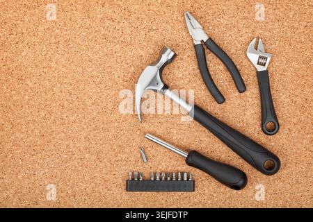 Set of tools on cork background Stock Photo