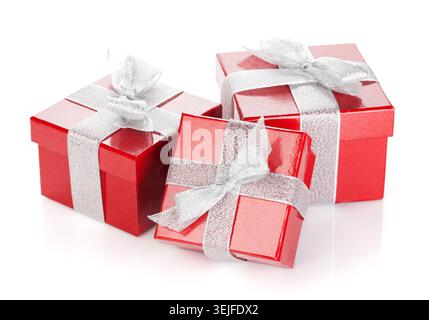 Three red gift boxes with silver ribbon and bow Stock Photo