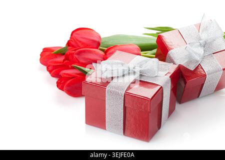 Fresh red tulips with gift boxes Stock Photo