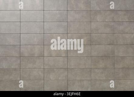 Elegant gray stone tiles for ventilated facade cladding. Background and texture. Stock Photo