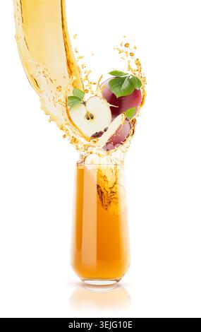 Fresh apple juice pouring in glass with flying vibrant red apple slices, green leaves, splashes of juice. Perfect for healthy dr Stock Photo