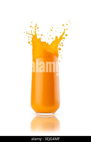 Fresh orange color vegetable juice of carrot or pumpkin, bright splashing of juice in glass, isolated. Antioxidant vitamin fruit Stock Photo