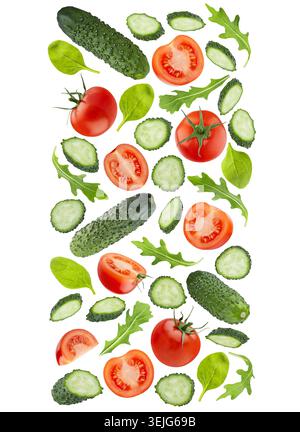 Healthy food background - decorative stripe, flow, border of flying diet vegetable salad ingredients, isolated. Red tomatoes, cu Stock Photo