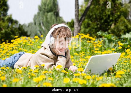 Homeschooling, distant learning. Chatting with Friends, Studying School Homework. Stock Photo