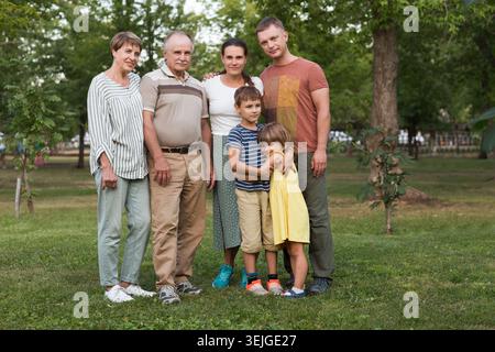 Portrait of multi generation family outdoors Stock Photo