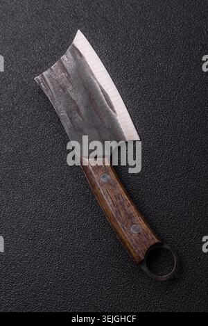 A kitchen cleaver or butcher's knife for cutting meat. A butcher's cleaver Stock Photo