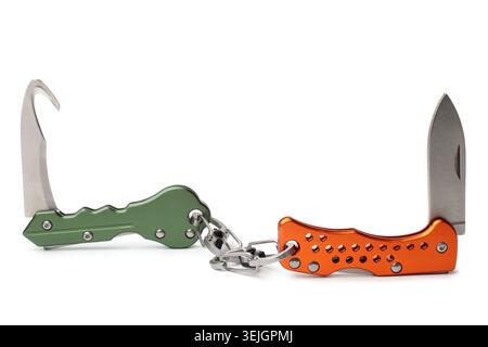Keychain clasp knifes on white background Stock Photo