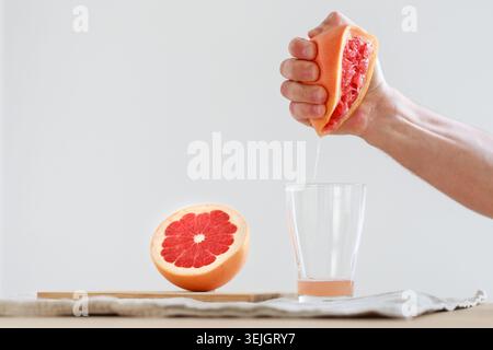 Hand squeezed grapefruit juice Stock Photo