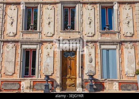 Decorated facade of a house in the town of Fontaine de Vaucluse in Provence France Stock Photo