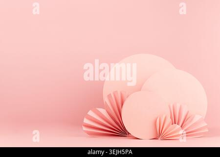 Valentines day pastel pink stage mockup - ribbed paper hearts, abstract round decorations on soft light background, copy space. Stock Photo