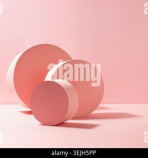 Modern geometric abstract stage mockup with pastel pink round shapes in sunlight with shadows on soft light background, square. Stock Photo