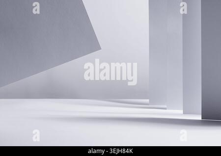 Abstract geometric white grey minimalist background with perspective of walls, stripes and flying paper in light and shadow as b Stock Photo