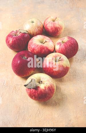Apples scattered on the table, selective focus, yellow - red, summer variety, early, no people, Stock Photo