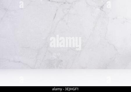 Light grey marble wall with white wood board as floor, empty interior for presentation, display, design. Stock Photo