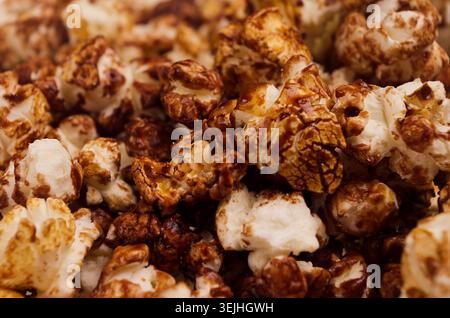 Chocolate popcorn macro with blur background. Stock Photo