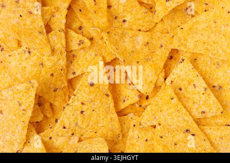 Classic mexican snack -  nachos background, top view. Stock Photo