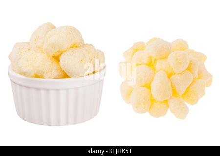 Set of sweet yellow corn sticks with powdered sugar as heap and in ceramics bowl isolated on white background. Fast food templat Stock Photo