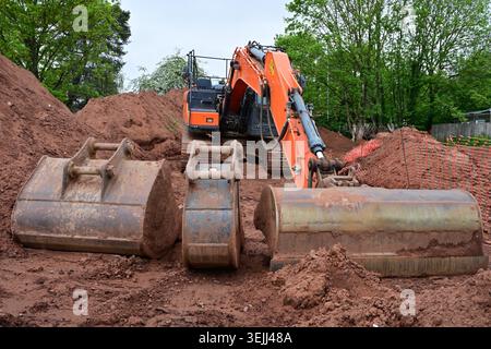 Stock image on the theme of construction: Yellow cranes are on the ...