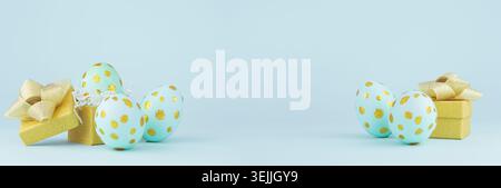 Festive easter banner - blue easter eggs with golden glitter dots and gift boxes on blue background, copy space. Stock Photo
