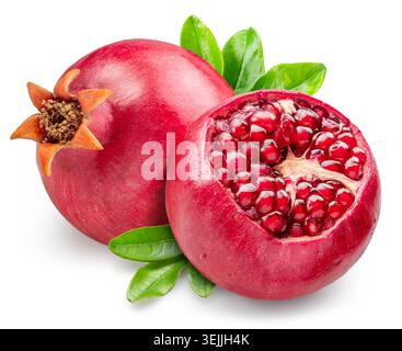 Pomegranate and opened pomegranate with red pomegranate seeds and leaves isolated on a white background. Clipping path. Stock Photo