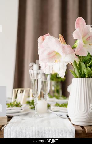 The wedding table setting and decor on wooden table in rustic style Stock Photo