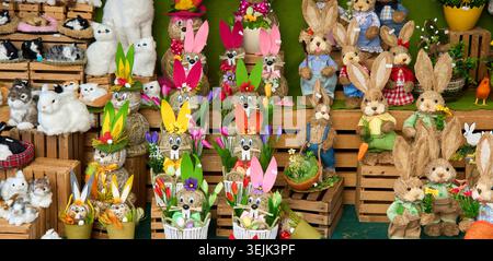 Easter market display with various handmade bunny figures and decorations. Stock Photo