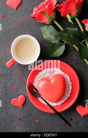 Red heart cake and espresso in small cup for valentines day , copy space Stock Photo