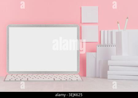 School template -  white books, stationery, blank stickers and notebook computer on white desk and soft pink background. Back to Stock Photo