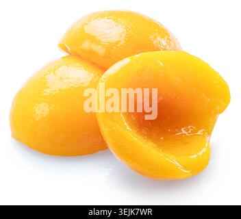 Peeled canned peach halves isolated on white background. File contains clipping paths. Stock Photo