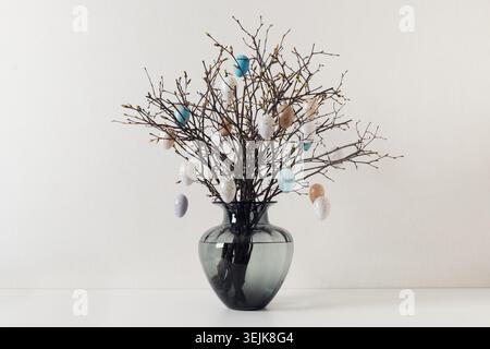 Minimal Easter tree made of branches and eggs Stock Photo
