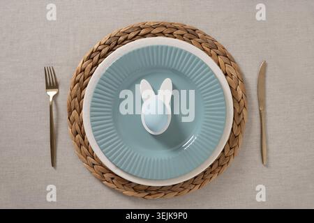 Easter table setting with bunny egg decoration Stock Photo