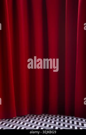 Twin peaks scene with red velvet curtain and black and white tile on floor, vertical. Theatre blank stage for presentation. Stock Photo