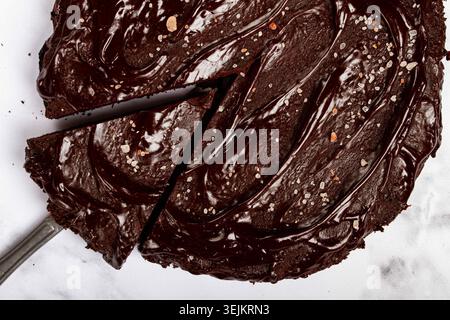 Chocolate cake, round cake, on a marble light table, top view, homemade cakes, no people, Stock Photo