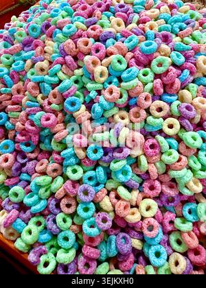 Colorful sugar-coated ring candies displayed in bulk at a market stall in Mexico City, Mexico Stock Photo