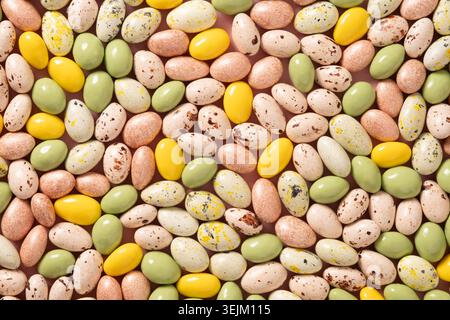 Easter white and pink chocolate candy sweets as eggs. Stock Photo