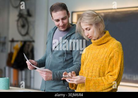Family business. small business. scheduling. people in the workplace are discussing a working strategy for doing business Stock Photo