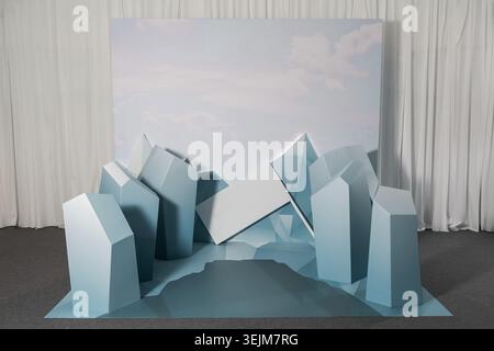 Indoor Event Photo Zone with Low Poly Geometric Blue Mountain Decorations Stock Photo