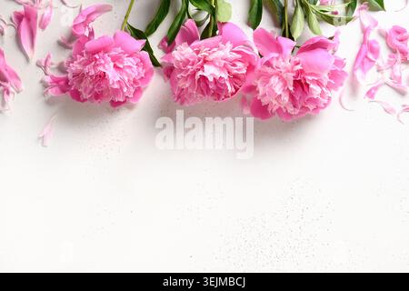 Bouquet of beautiful pink peony flowers on white. Stock Photo