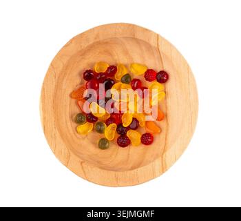 Fruit gummy candy pile in wood bowl isolated, vegan chewing marmalade pills, jelly gumdrops heap, colorful gelatin candies set on white background top Stock Photo