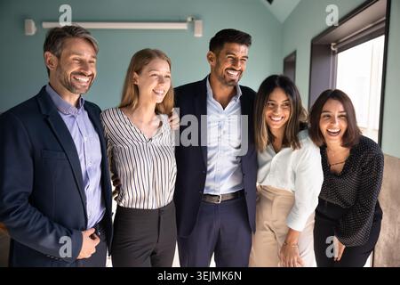 Diverse group of businesspeople, staff members posing together for portrait Stock Photo